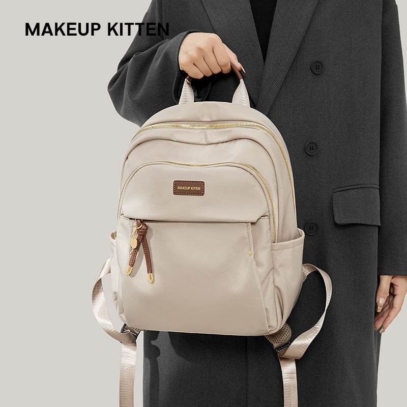 MK正品双肩书包帆布初中高中女生