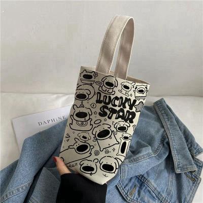 精致小布袋手提帆布包手提袋2024款水杯袋小拎包单肩手腕韩版小包