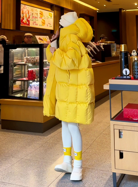 2025年冬季新款设计感黄色方块格中长款连帽保暖羽绒棉服外套女潮