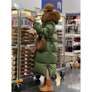 牛果绿色大毛领羽绒服女2026年冬季新款时尚洋气长款过膝加厚外套