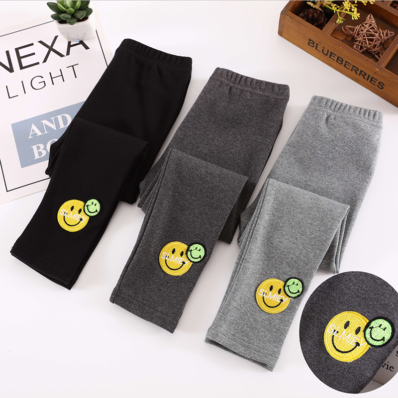 Boys and girls pants smiling face printing autumn and winter childrens clothing baby bottoms wear cashmere cotton pants, foreign style