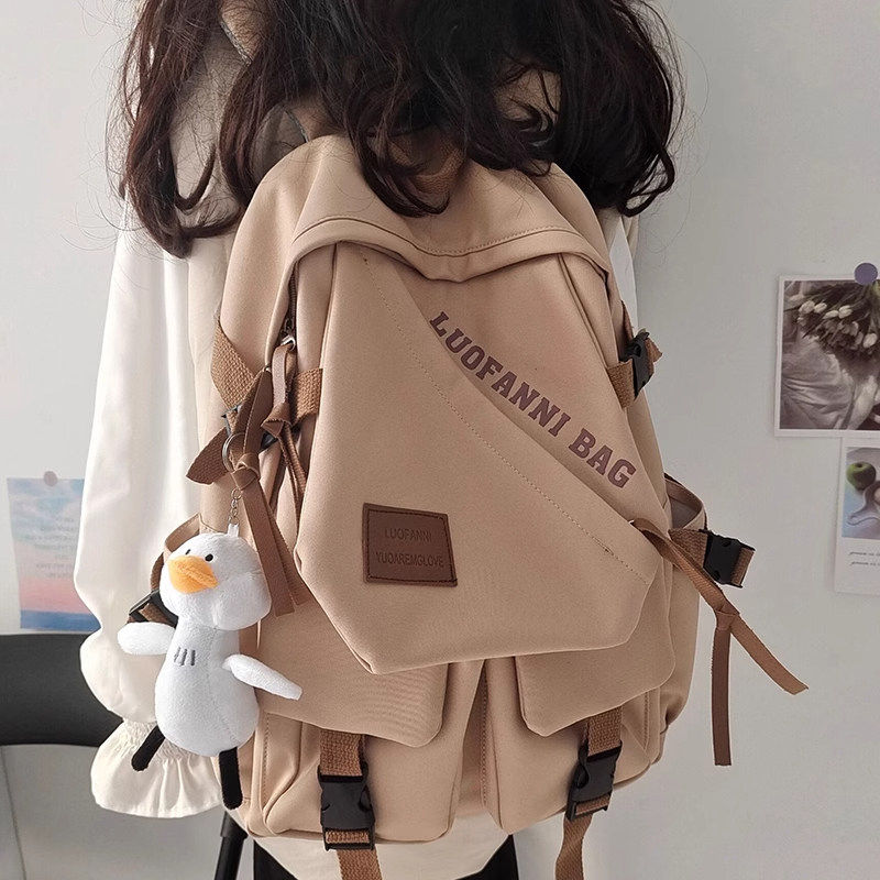 德国复古双肩包初中女生书包男款复古工装大容量耐脏背包中学书包