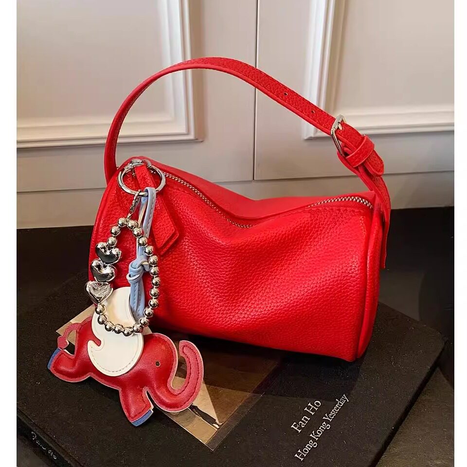 韩系红色手提枕头包包女式2025新款夏天时尚超火斜挎包外出小拎包