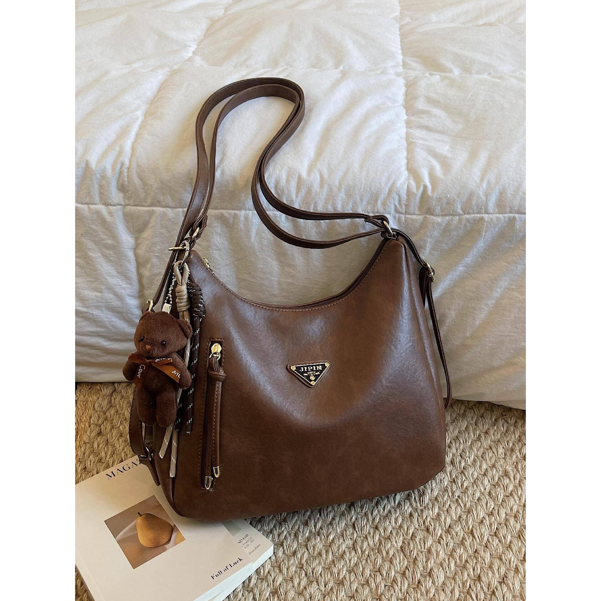 高档品牌畅销大容量通勤双肩包女2026新款百搭休闲日常上班斜挎托