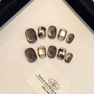 纯手工爆闪猫眼蝴蝶结小众高级穿戴甲美甲贴片可 熔岩生巧