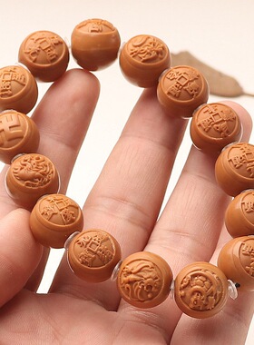 厂家直供猴头核桃凤羽籽雕刻 古币四象 手串核雕文玩把玩件手持