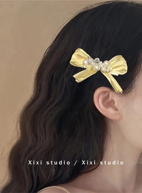 轻奢高级新款多巴胺精致黄色蝴蝶结珍珠发夹后脑勺鲨鱼夹抓夹发饰