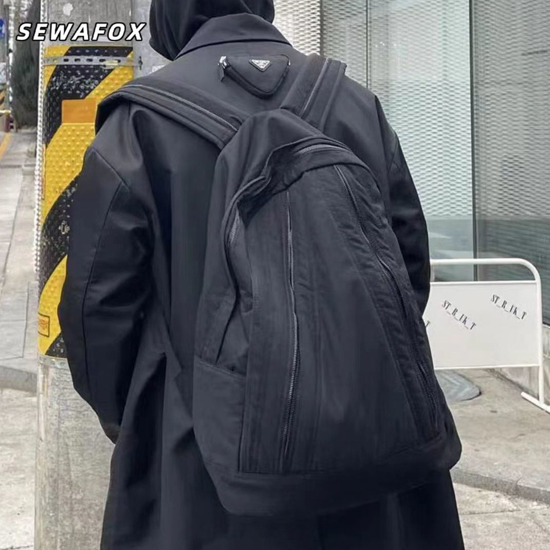 男士双肩包休闲简约日常通勤大容量背包轻便时尚学生潮牌书包黑色