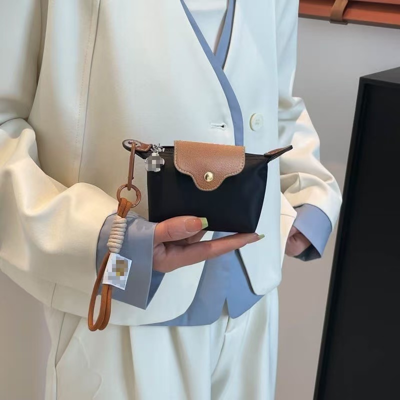 新款饺子百搭手拿包大容量挂绳手挽包贝壳零钱包便携手拎包口红包