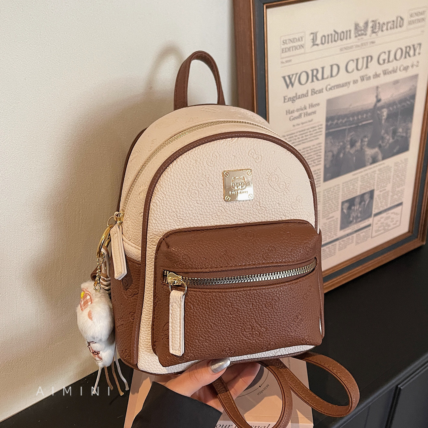 撞色可爱压花双肩包女小型2026春季新款时尚百搭日常逛街小背包