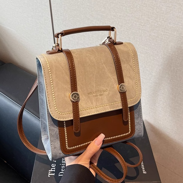 高级感复古撞色牛仔双肩包女2025秋冬新款时尚百搭通勤斜挎小背包