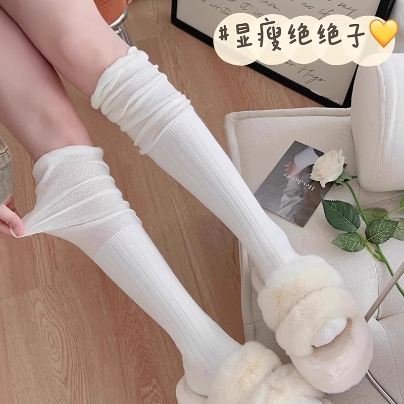 搭配靴子的过膝小腿瘦腿袜