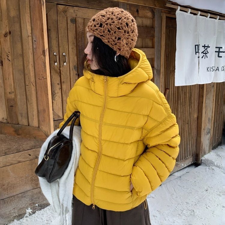 排骨羽绒服2025冬90白鸭绒新款泡芙感宽松连帽超轻保暖短款女外套