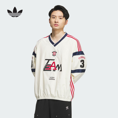 adidas阿迪达斯冬三叶草新款梭织运动宽松球衣男长袖上衣 KC0112