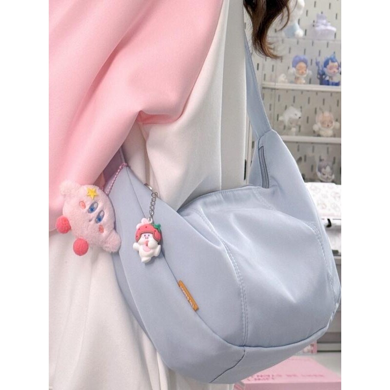 法国包包女韩初中女生简约斜挎包女学生休闲百搭单肩大容量饺子包