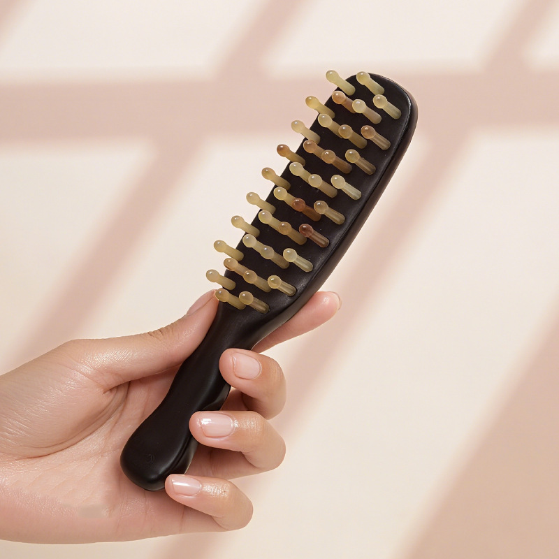 紫光檀羊角钉排刷按摩梳