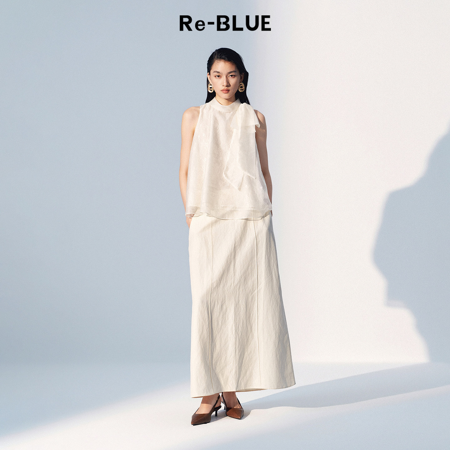 Re-BLUE轻奢优雅女装舒适简约度假风肌理感半身裙气质通勤长裙