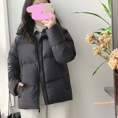 黑色白鸭绒羽绒服女2025