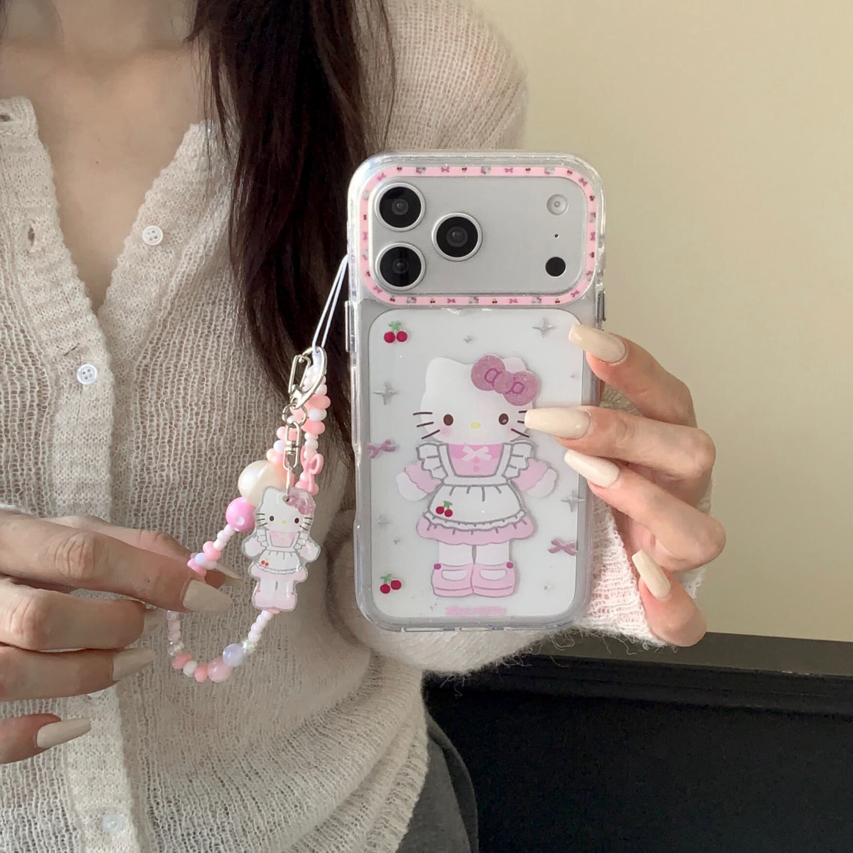 日本HelloKitty甜美粉色裙KT猫适用苹果17promax手机壳15全包按键大视窗14/13创意卡通硅胶挂绳壳16防摔保护