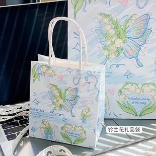 ins轻奢精致铃兰花蝴蝶手提加厚礼品袋高颜值牛皮纸收纳购物纸袋