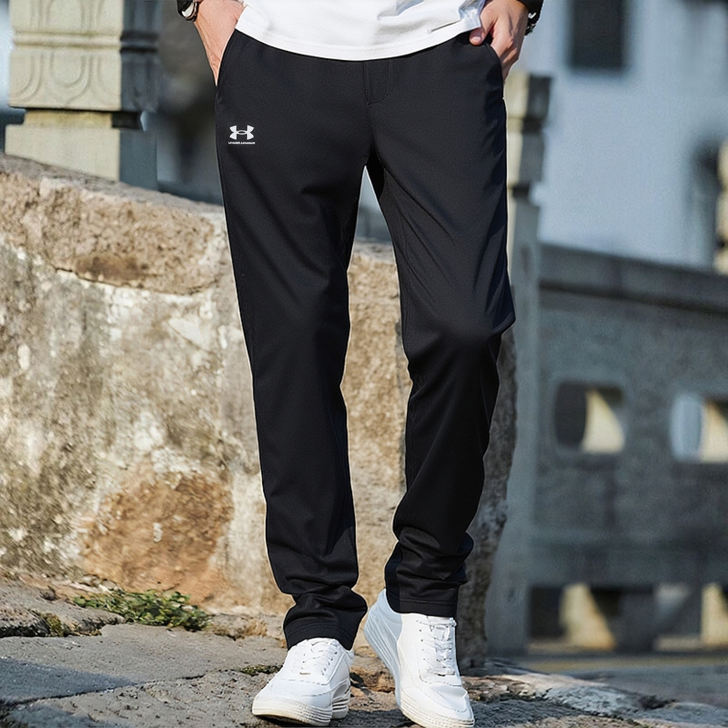 安德玛男子针织直筒运动裤