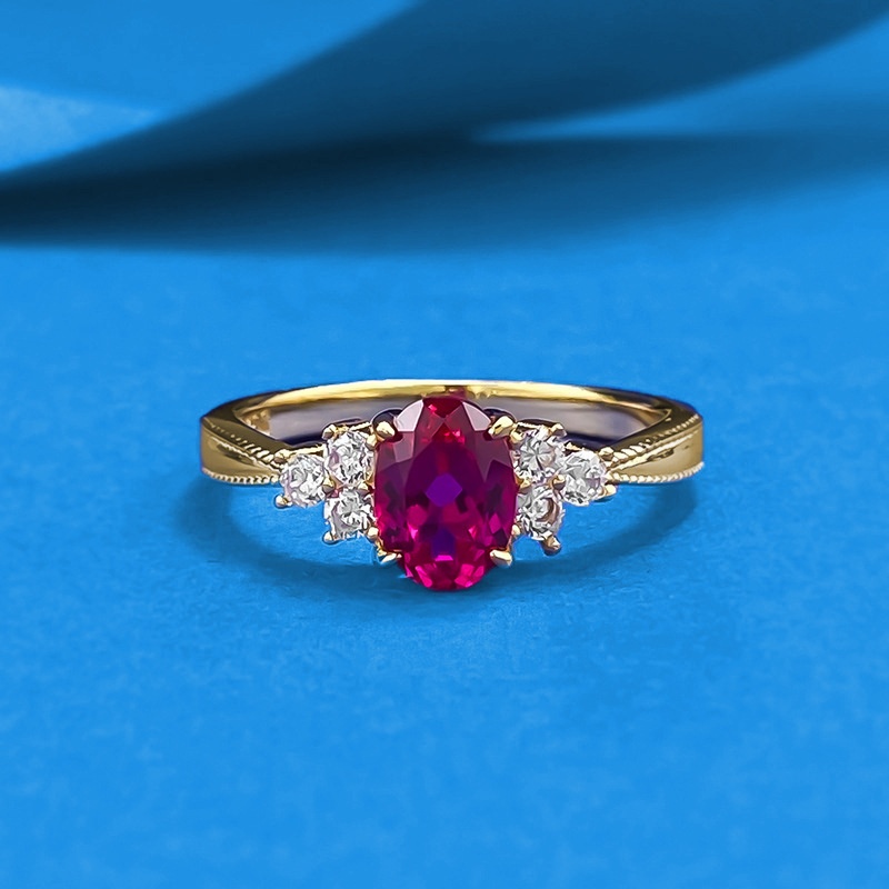 辉之翼珠宝 新款s925纯银鸽血红5*7mm椭圆红刚玉珠边戒指女感