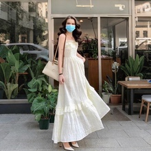 春夏高级感小众雪纺杏色连衣裙过膝长裙甜辣妹荷叶边别致吊带裙女