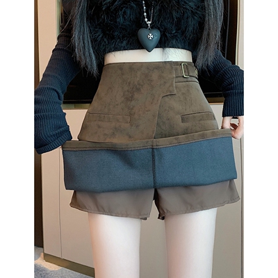秋冬款不规则设计感皮扣半身裙