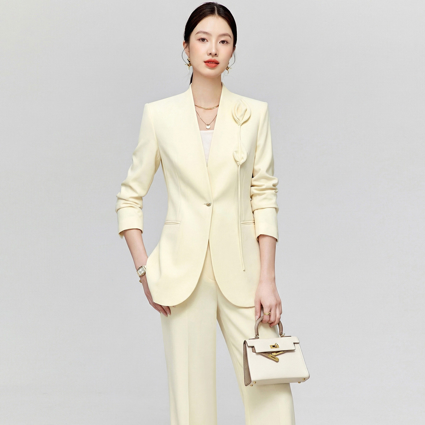 个性职场通勤小西服2026春季新款透明黄高级感小众设计V领职业装