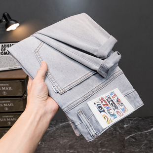 意大利高端品牌浅灰色牛仔裤男修身小脚百搭潮流春夏季薄款休闲裤