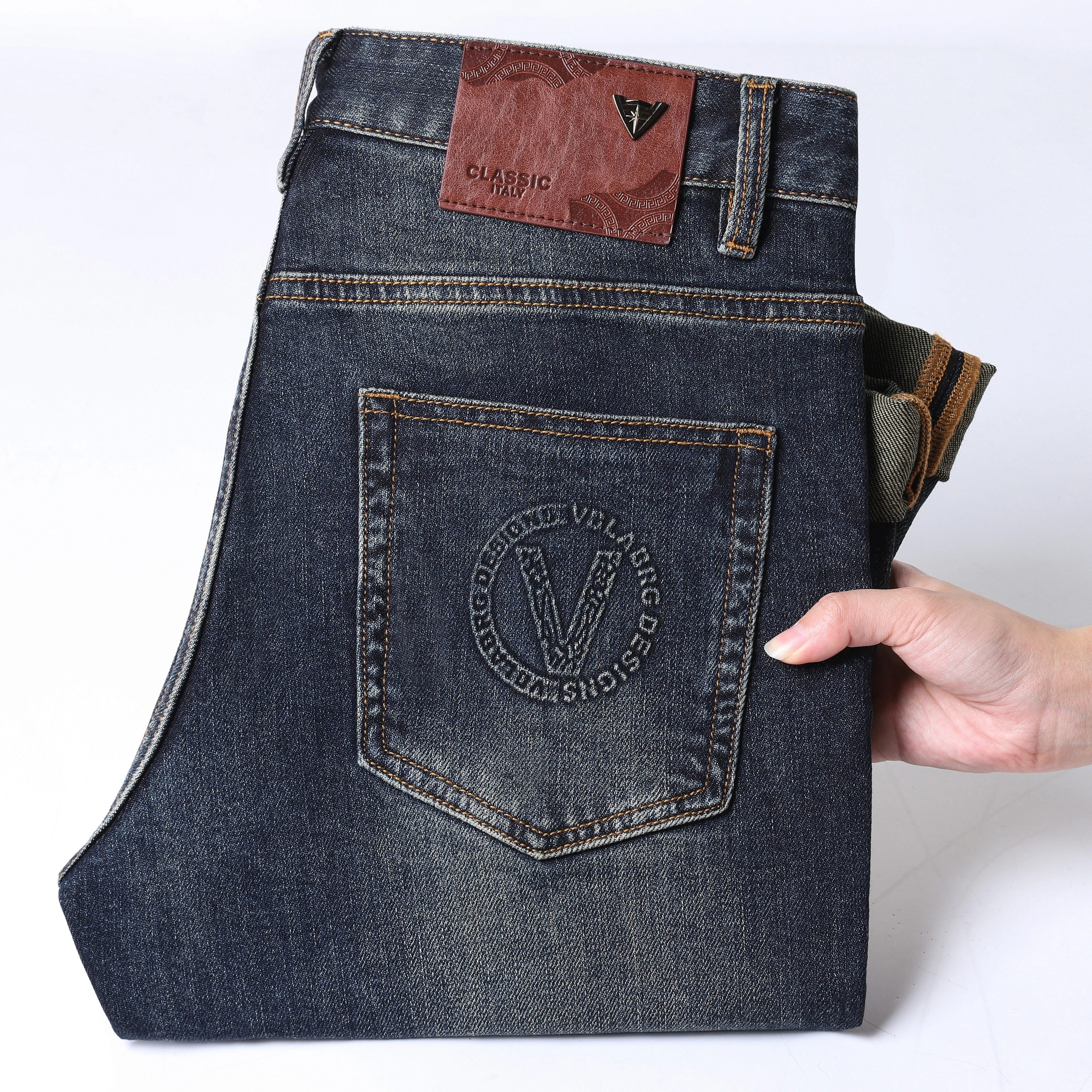 香港高端蓝色牛仔裤男士2025新款修身小脚弹力时尚潮流秋冬季裤子