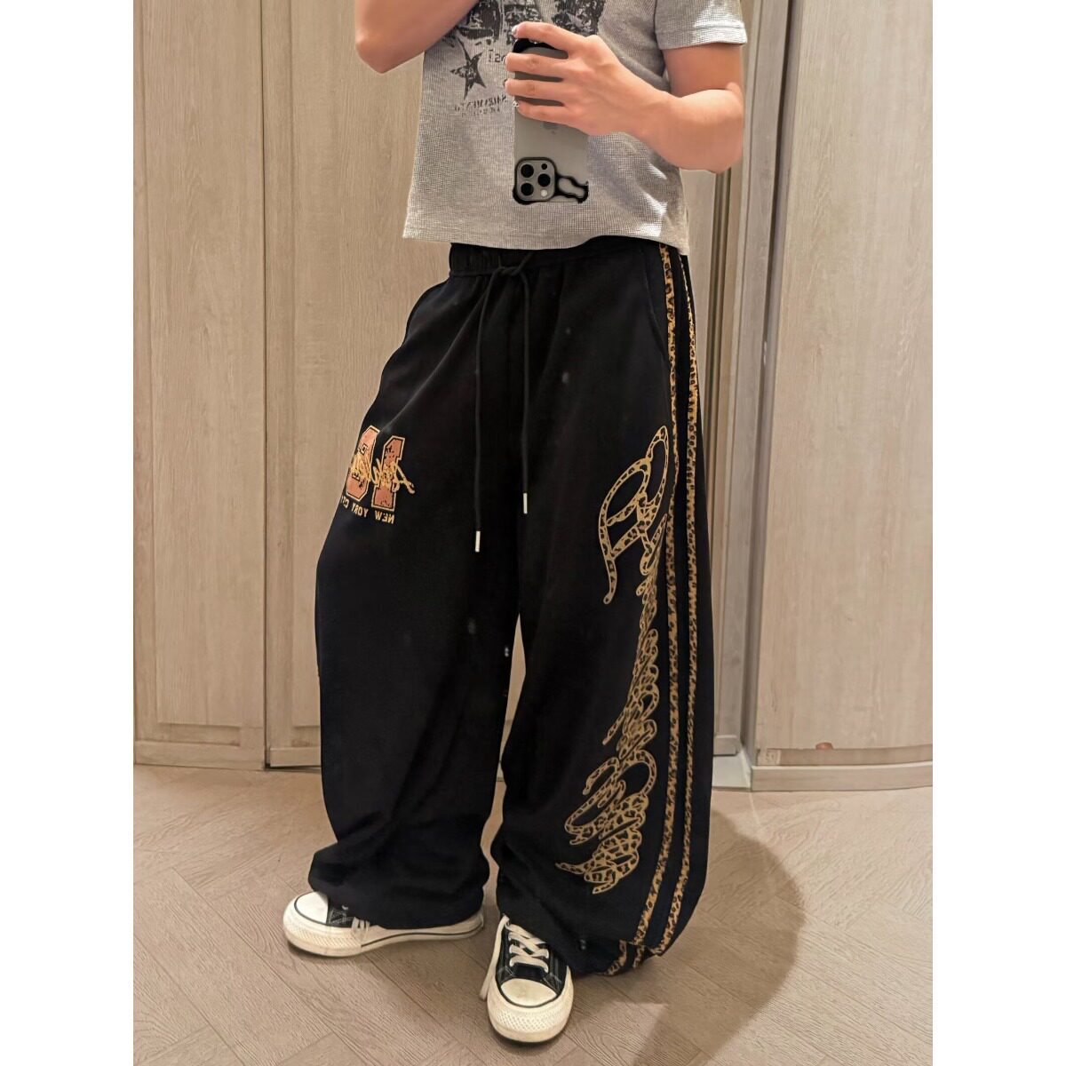 特大码斤女mm风裤子阔腿胖牛仔裤bf黑色女装拼接豹纹300宽松慵懒