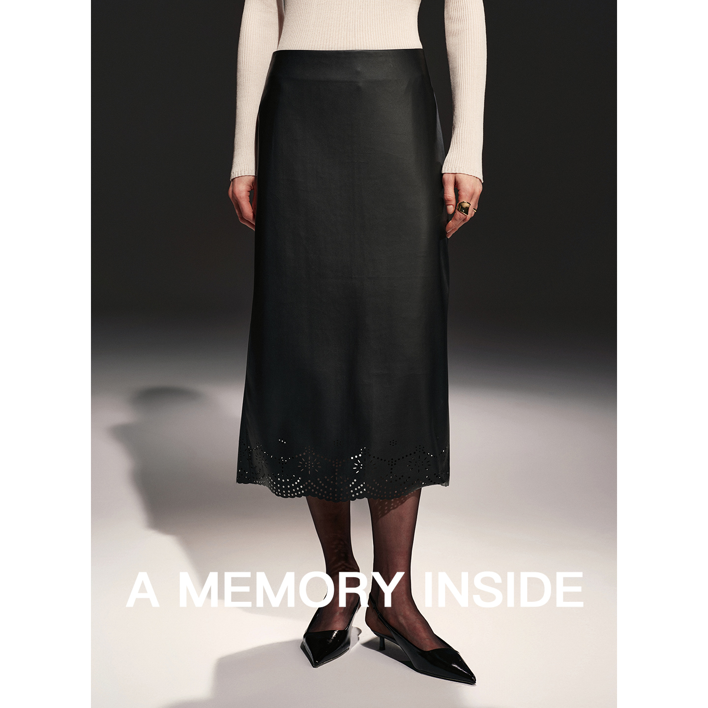 日本进口pu皮激光雕孔皮裙女