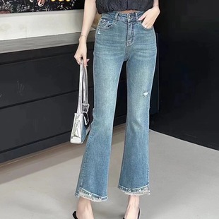 香港花牌芭莎BASHA春秋欧货蕾丝花边蝴蝶扣饰弹力微喇叭牛仔裤 女