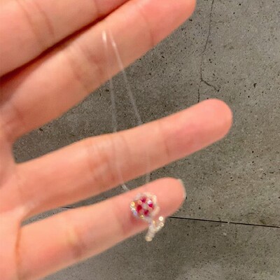 中古爆闪红色花朵锆石鱼线项链2026新爆款高级感极细毛衣链女配饰