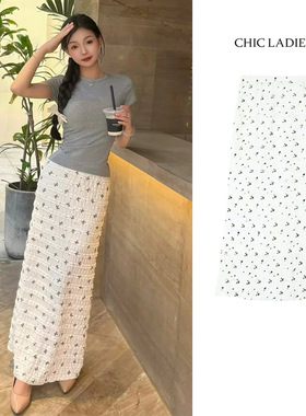 明星同款蝴蝶结碎花白色a字半身裙女夏新款高腰显瘦鱼尾包臀裙子