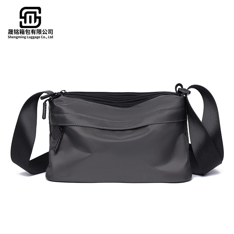 男士皮膜斜挎包潮流2025新款尼龙包学生休闲单肩包时尚男士商务包