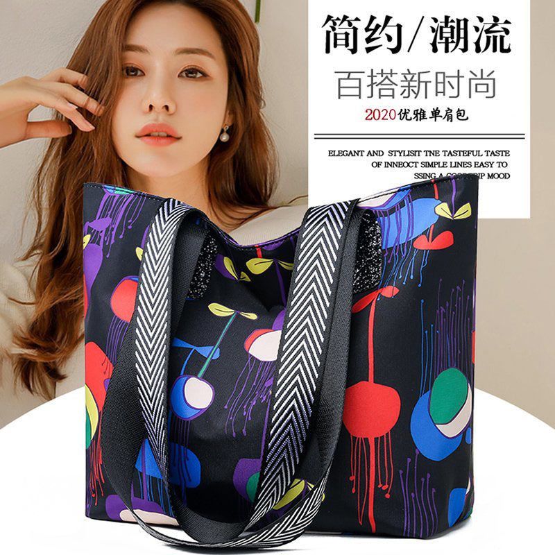 时尚大包女2025新款女士帆布包上班族通勤妈妈包大容量防水单肩包
