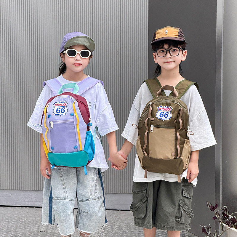 新款韩版潮流儿童双肩包拼色男孩女童休闲背包时尚字母幼儿园书包