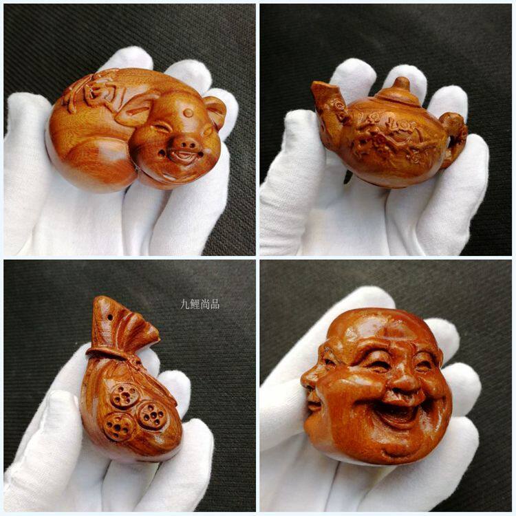 老挝黄花梨手把件四面佛