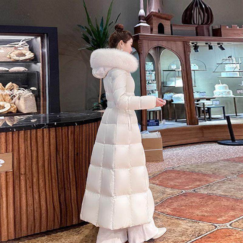 长款过膝设计感连帽收腰季2025年新款白色大毛领羽绒棉袄外套