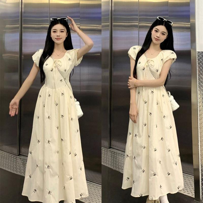 碎花连衣裙夏季新款印花泡泡袖蝴蝶结气质收腰女裙子