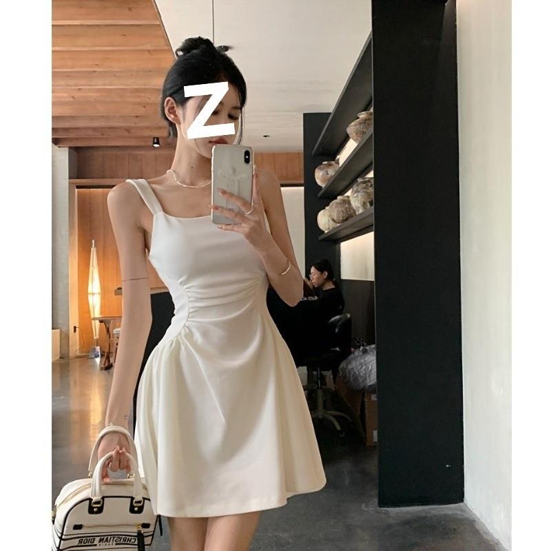 法式赫本风气质礼服小白裙女早春季高级感纯欲收腰a字吊带连衣裙