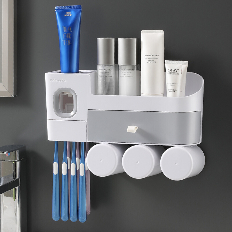 Wall-mounted toothbrush holder squeezing toothpaste Nailfree