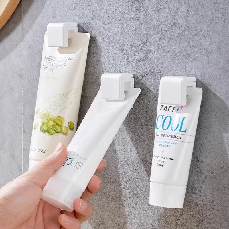 牙膏架免打孔壁挂式洗面奶浴室卫生间置物架墙上护肤品收纳挂夹子