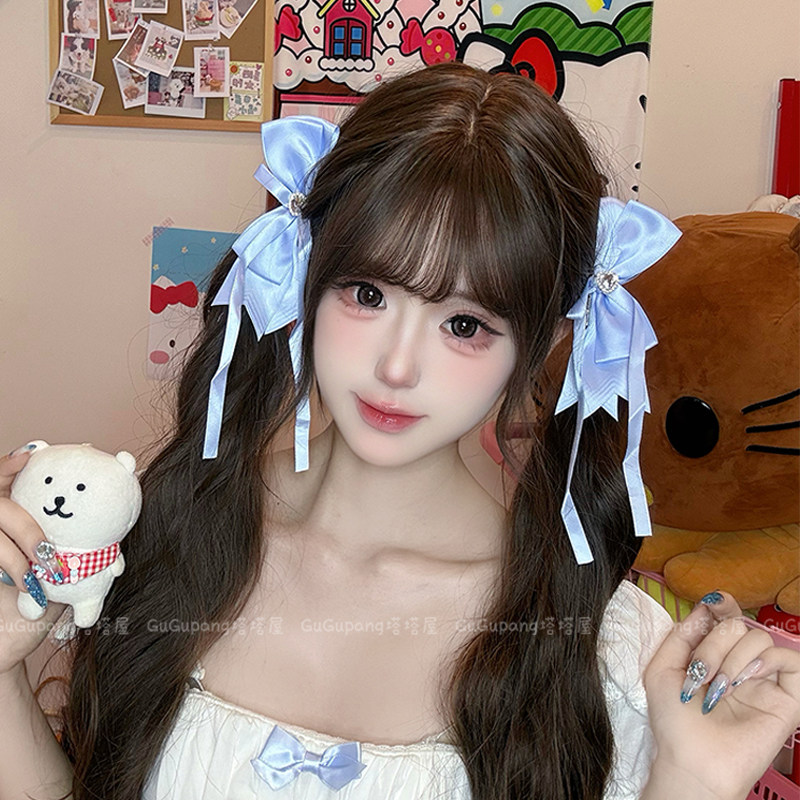 少女蓝色蝴蝶结飘带发夹图片