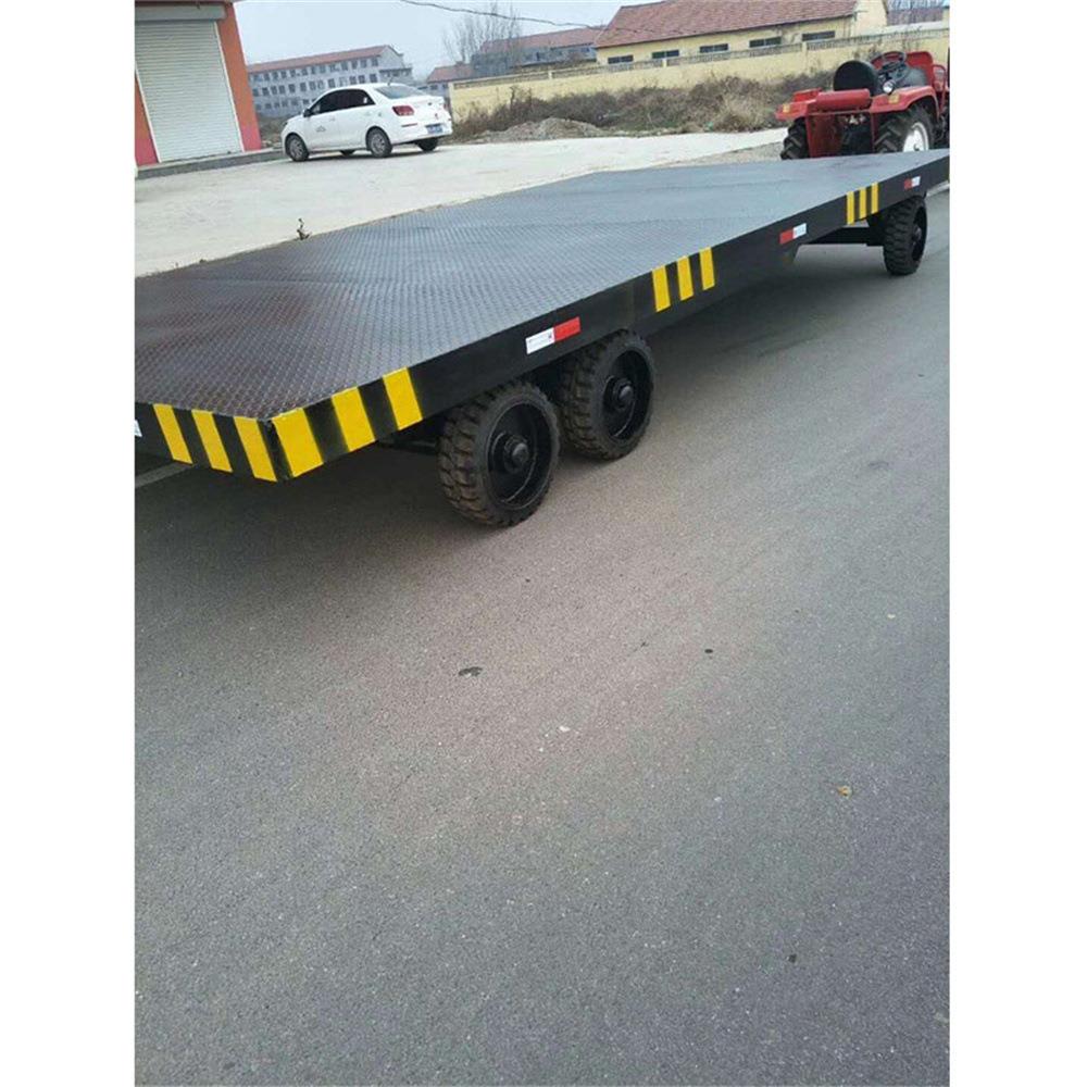 集装箱用平板车牵引式物料装卸运输车工业货物电动液压工具车