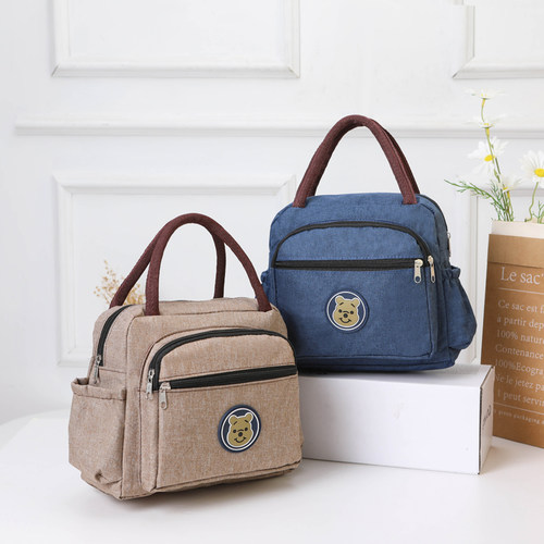 手提包女包牛仔布多拉链饭盒袋小圆包防水加厚便当袋妈咪包小布包