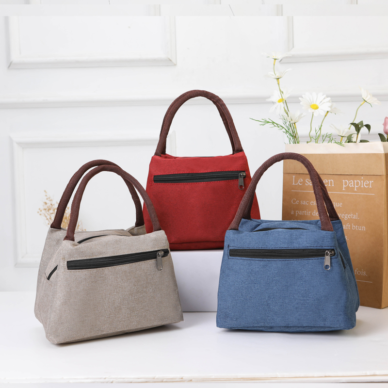 手提包女包防水加厚小布包饭盒袋便当包帆布收纳袋化妆包妈咪包