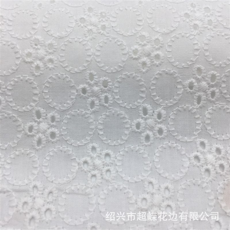 厂家直供2024春夏大v机绣面料童装女装几何圆形绣花面料